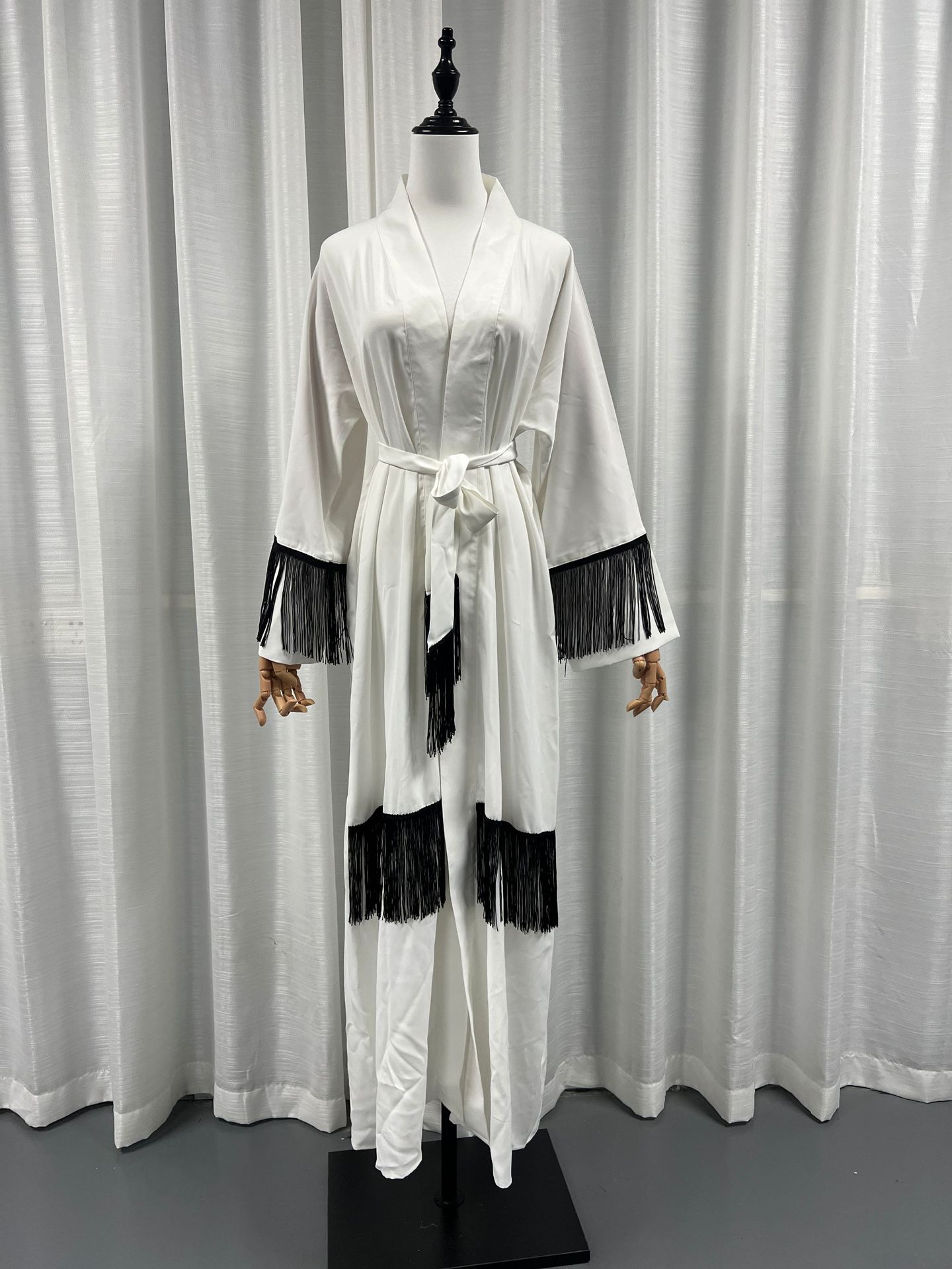 White Abaya with Pom-Poms – Elegant and Modern Muslim Dress