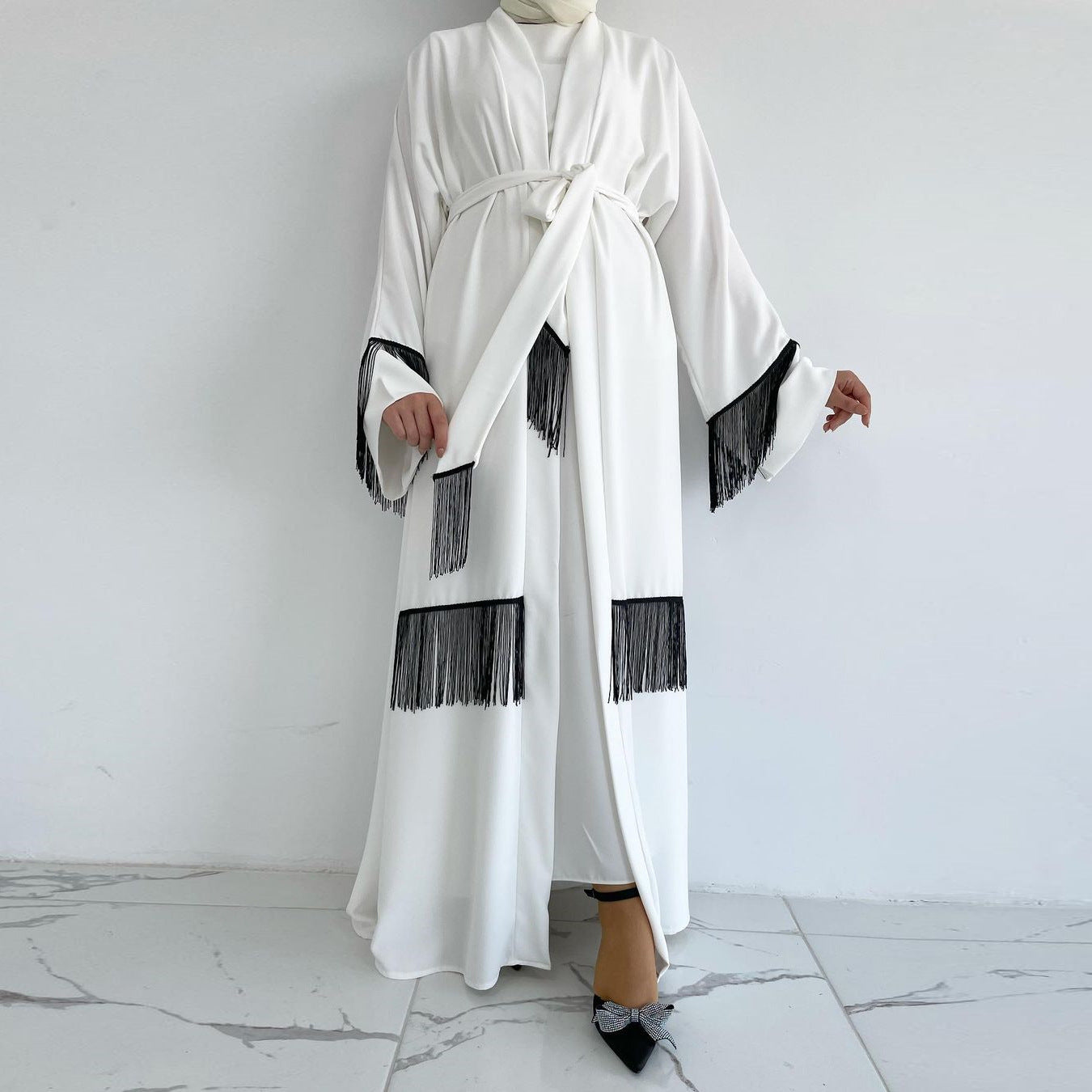 White Abaya with Pom-Poms – Elegant and Modern Muslim Dress