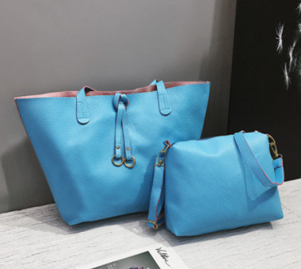 Sac bandoulière élégant – Ruban signature (2 pièces)