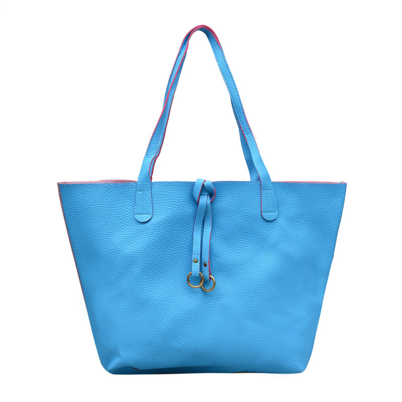 Sac bandoulière élégant – Ruban signature (2 pièces)