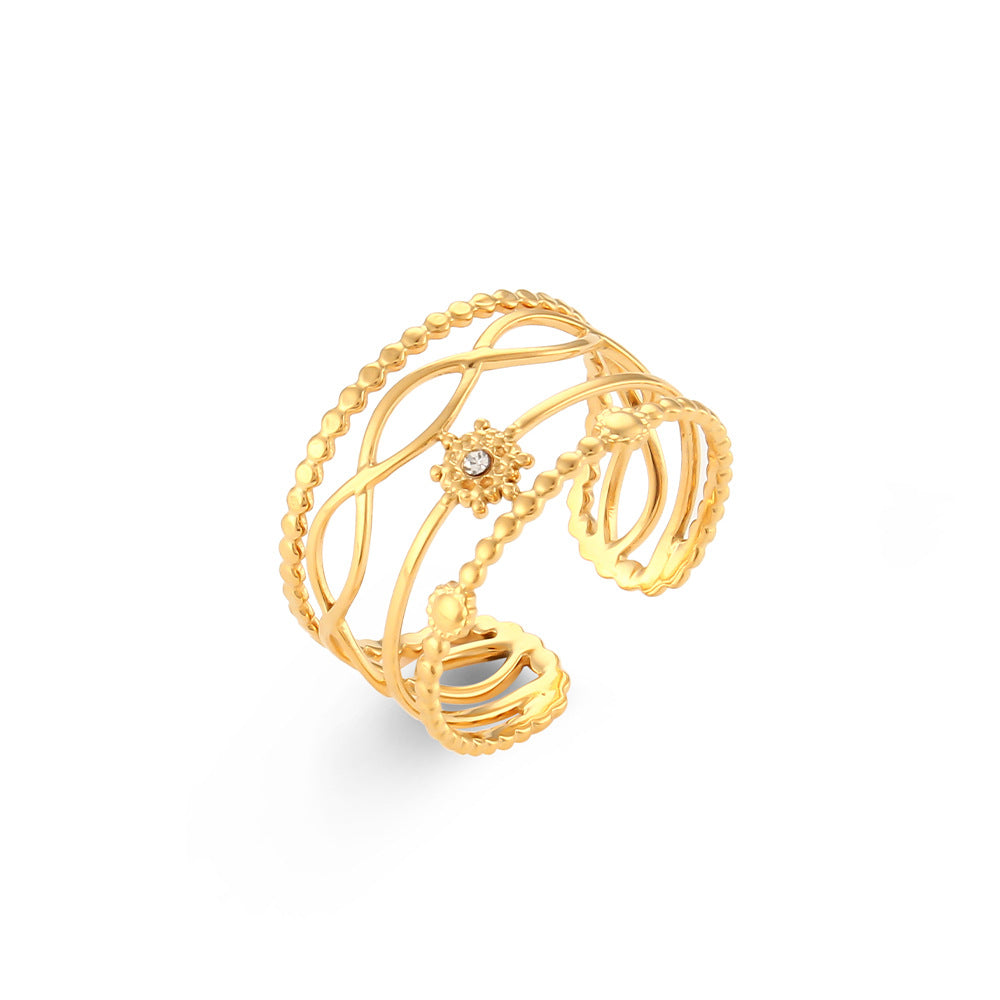 Bague Fleur Dorée Ajustable – Élégance