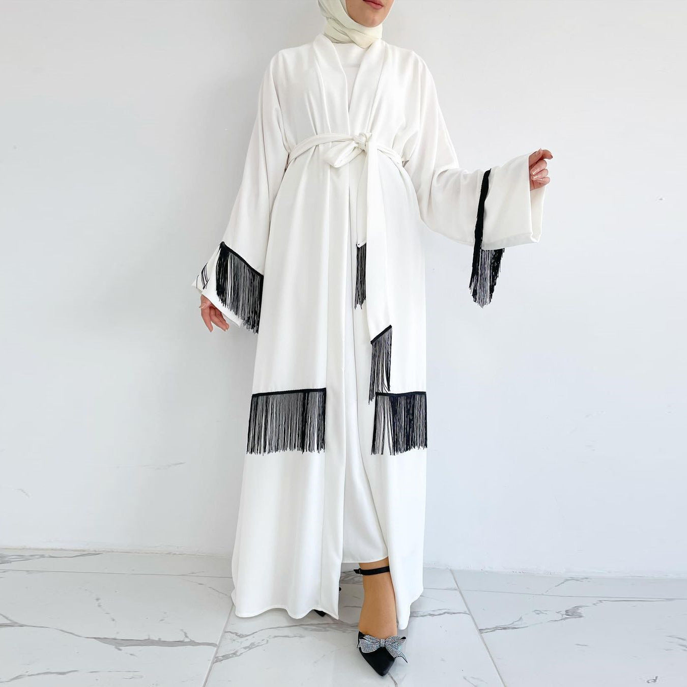 White Abaya with Pom-Poms – Elegant and Modern Muslim Dress